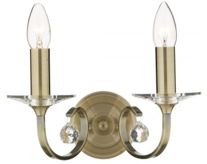 A Double-Arm Wall Light Finished in Antique Brass ID Large View