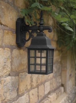 A Traditional Outdoor Wall Light with Textured Glass ID Large View